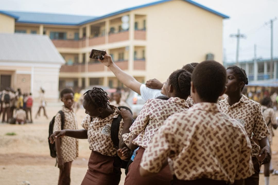 Students gathered together in a school courtyard
