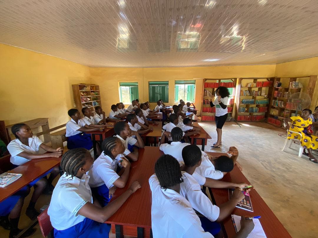 Students seated in a classroom during a Student Meets Graduate session
